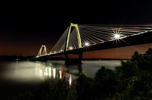 A beautiful shot of Lewis and Clark Bridge at night in Louisville, Kentucky, United States