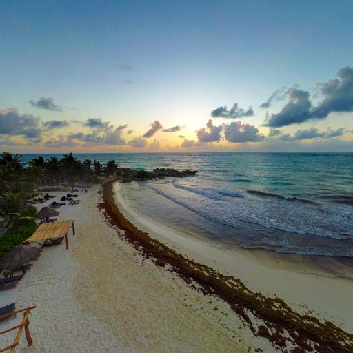 A mesmerizing view of sunset on Tulum Beach Mexico Caribe Cancun