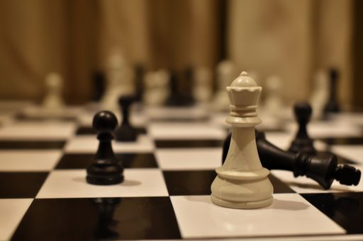 A Selective focus of vario Chess Pawn on chess board, with background blur. Chess is an Indoor game played across the World
