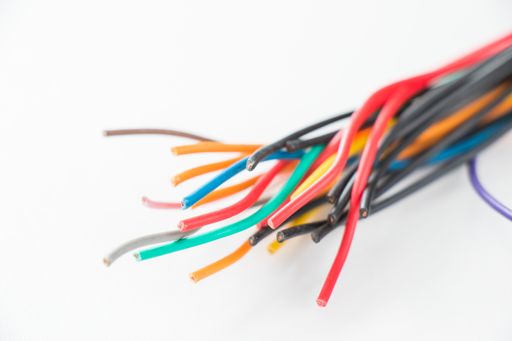 Colorful electric cables on a white background