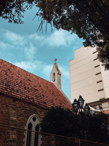 An old stone church in Rio de Janeiro against the blue sky