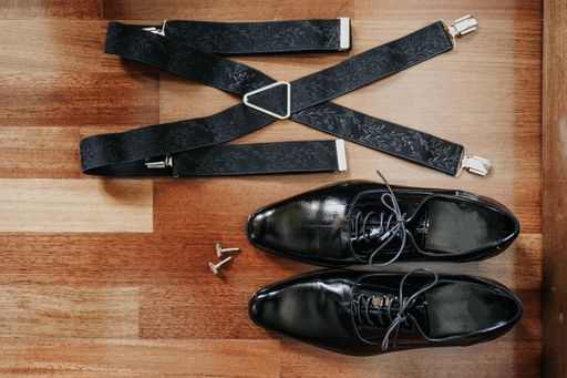 The classic leather shoes with accessories for a wedding day look