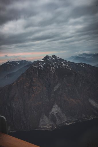An aerial shot of snowy mountains of Piani dei Resinelli in Lecco, near Como Lombardy, Italy