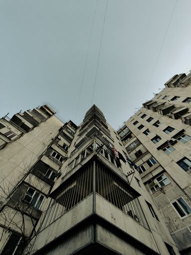 A low angle shot of a post Soviet high residential building