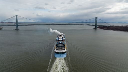 An aerial view of the Royal Caribbean cruise ship, Anthem of The Sea leaving NY, in Upper Bay heading towards the Verrazano Bridge