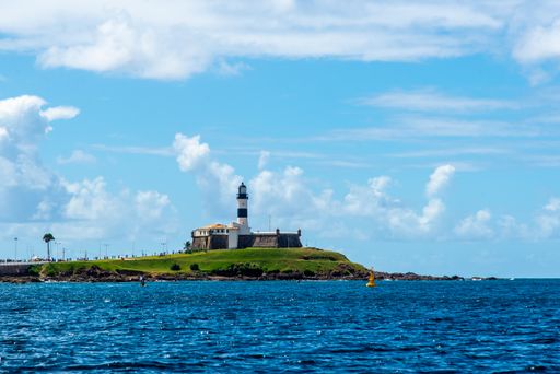 A scenic shot of the view of the sea from Forte da Barra in the city of Salvador, against cloudy sky.