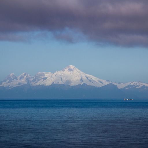 A vertical shot of the Mount Iliamna viewed from the Gulf of Alaska, USA
