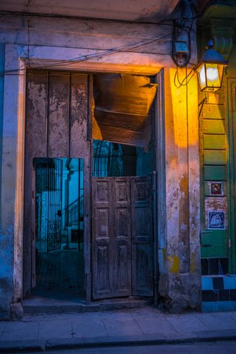 A beautiful shot of an old, broken  wooden door