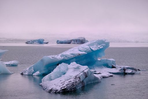 Huge floating iceberg in Fjallsarlon Lake Southern Iceland during winter - November