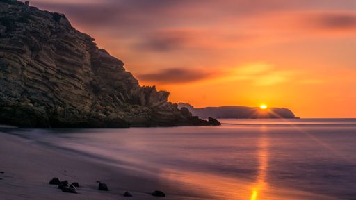 A closeup of sunrise over Figueira beach at the morning