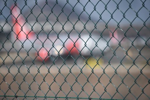 A selective focus of a mesh fence