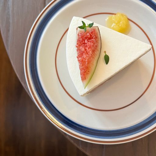 a top view shot of dessert cake with fruit on it