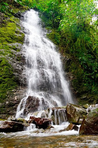 A vertical shot of a beautiful Cascada Cola de Caballo waterfall under Monte Perdido