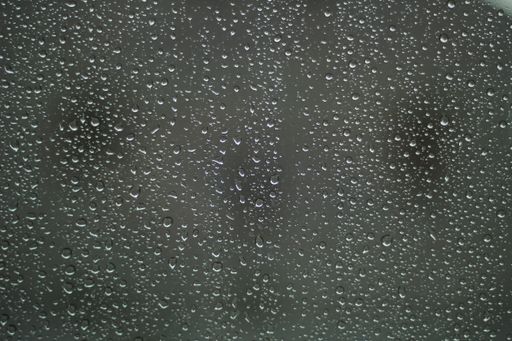 A closeup shot of raindrops on the window