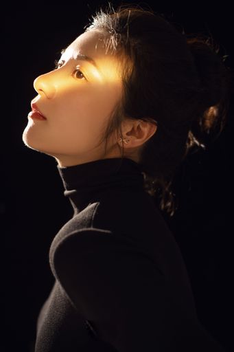 A closeup of a portrait of a beautiful young Asian woman