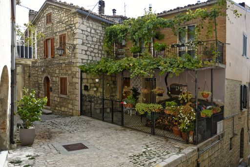 A narrow street among the houses of Ferrazzano in the Molise region of Italy