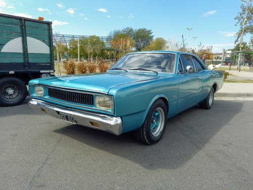 Avellaneda, Argentina - Apr 3, 2022: old sporty sky blue cyan Dodge Polara coupe 1970s two door by Chrysler Fevre Argentina. Classic car show.