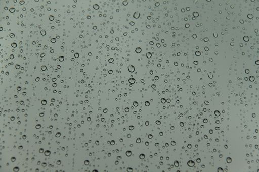 A closeup of water drops on a window. Great for backgrounds and wallpapers