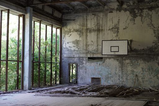 An abandoned derelict basketball court in Pripyat, Chernobyl Exclusion Zone