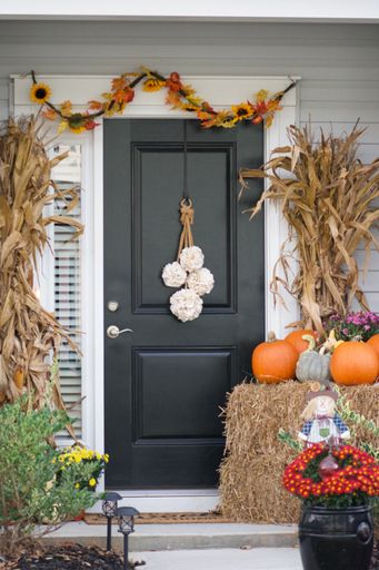 A vertical shot of Halloween Front Door Display Decoration