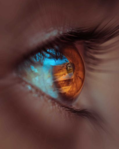 A close up shot of a female brown eye
