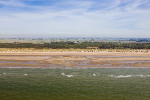 A high angle shot of a bay of De Haan, Belgium