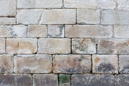 A closeup of an old brick wall