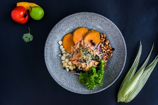 A high angle shot of the delicious Peruvian ceviche dish in a beautiful plate
