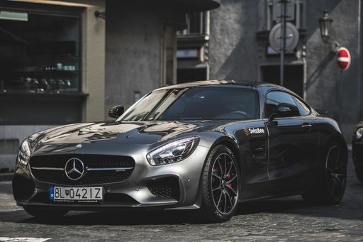 A modern gray fast car parked in the Praga street-Mercedes Benz C120 AMG GT