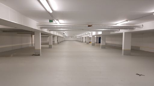 A closeup of an underground empty parking lot