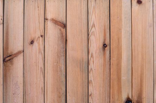 A closeup shot of a wooden plank surface with copy space