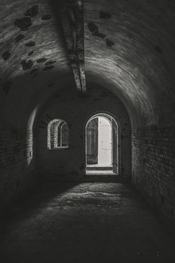 A grayscale of interior of the Suomenlinna sea fortress in Finland