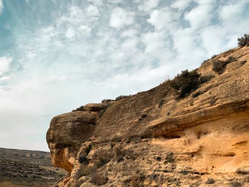 A picture of a canyon under the blue sky