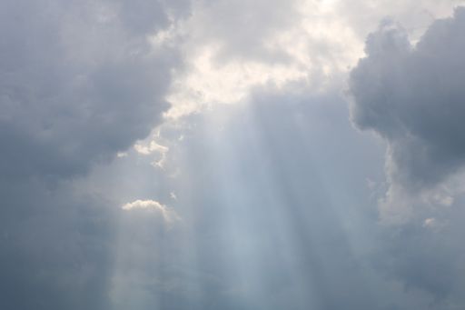 A beautiful low angle shot of large cumulative clouds in the sky during a gloomy day