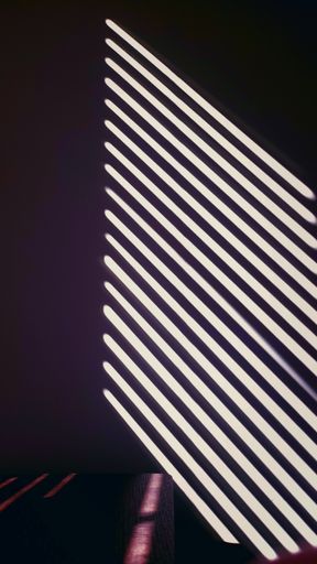 A vertical shot of the sunlight beaming into the room through window