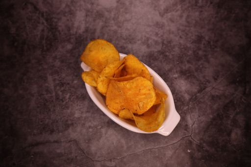 A top view of red chili chips