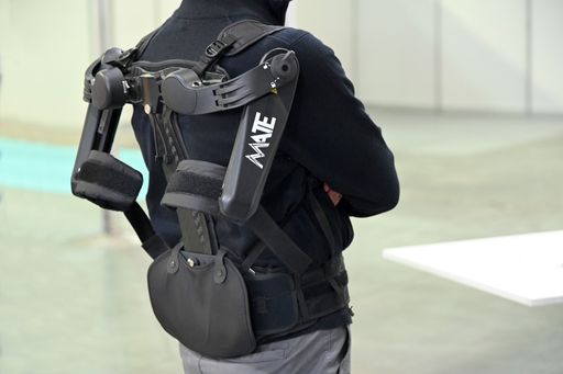 A closeup of a Comau Exoskeleton on a person in Turin, Italy