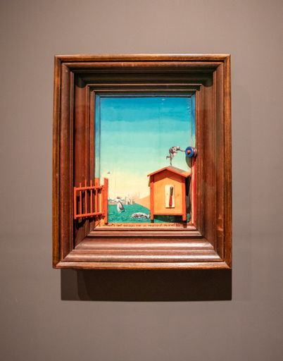 A closeup of a painting in the Tate Modern Surrealism Beyond Borders exhibition