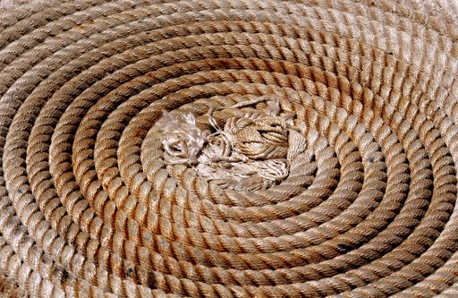 A closeup shot of a rope in a spiral