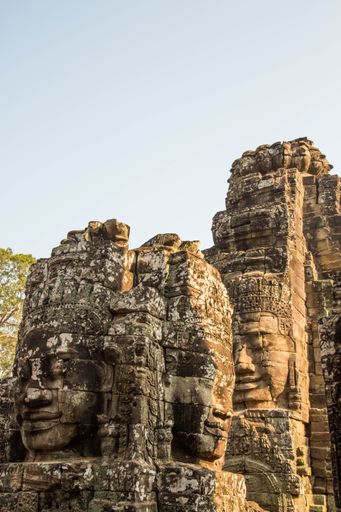 A vertical shot of statue details on the Angkor Wat Temple in Cambodia