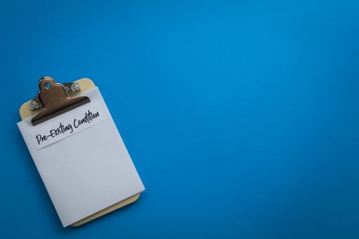 A closeup shot of a doctor's prescription note on a blue surface