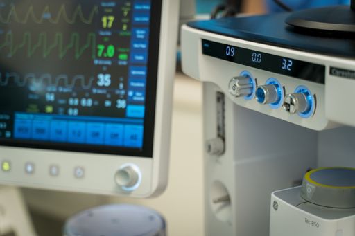 An anesthetic machine located in the operating room