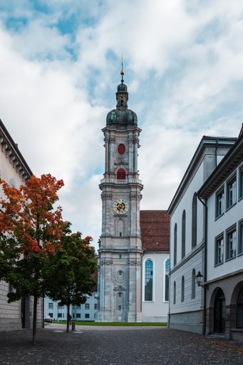 A vertical distant shot of the Saint Gallen Cathedral on a cloudy day in Switzerland
