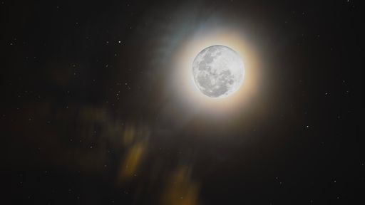A full moon illuminating in the night sky
