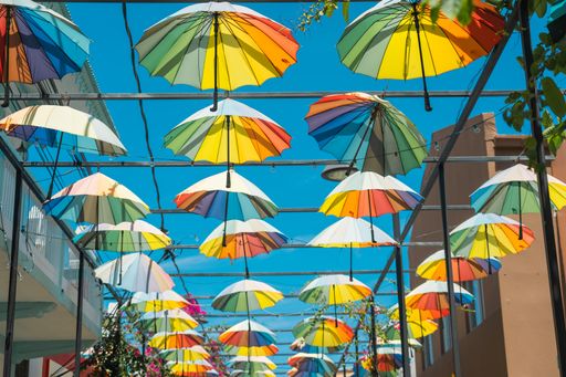 A street decorated with colorful umbrellas in Puerto Plata, Dominican Republic