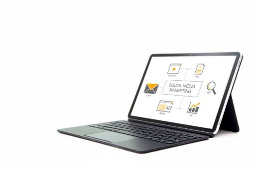 A tablet with a presentation about social media marketing on its screen isolated on a white background