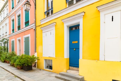 Paris, colorful house rue Cremieux, typical street