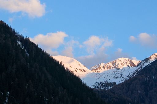 A beautiful shot of a mountain covered in snow during the day in winter