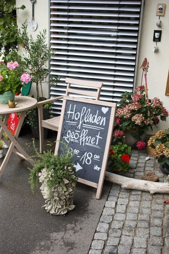 A vertical shot of a shop with chalkboard signage in Friedrichshafen, Germany
