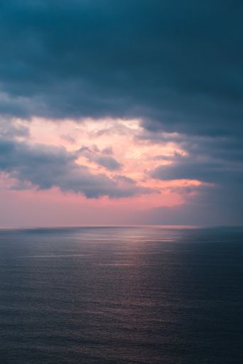 A beautiful view of the calm sea during sunset